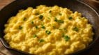 scrambled eggs, rustic kitchen, creamy texture